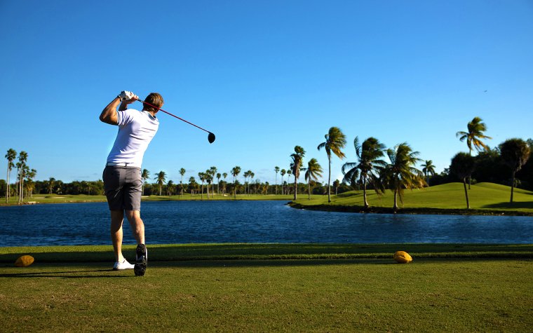 Man golfing at Crandon Golf at Key Biscayne Crandon Golf