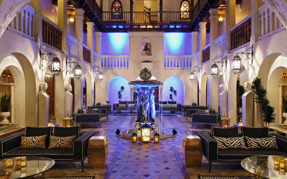 The Villa Casa Casuarina lobby with luxurious decor and intricate details