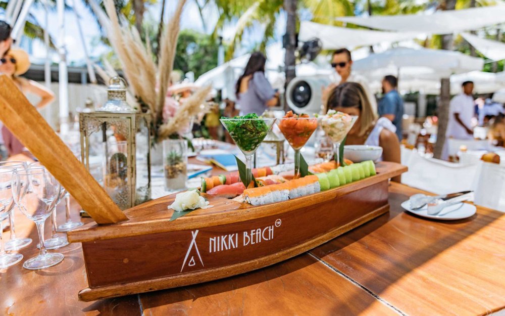 Sushi rolls served plated in a boat at Nikki Beach Sushi rolls served plated in a boat at Nikki Beach