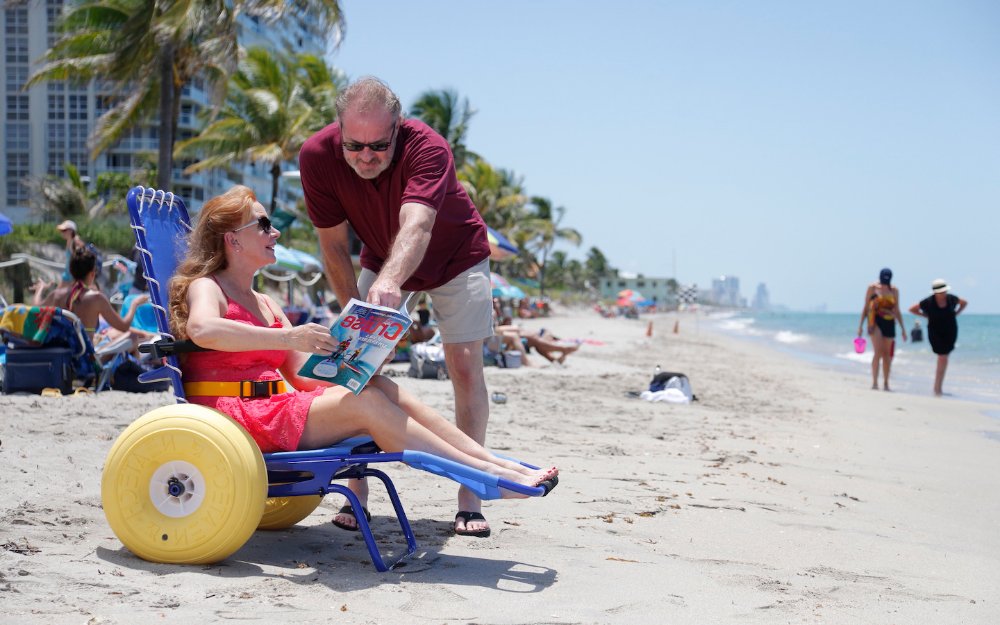 Lady on Joy on the Beach Wheelchair, by Special Needs Group® Special Needs at Sea®