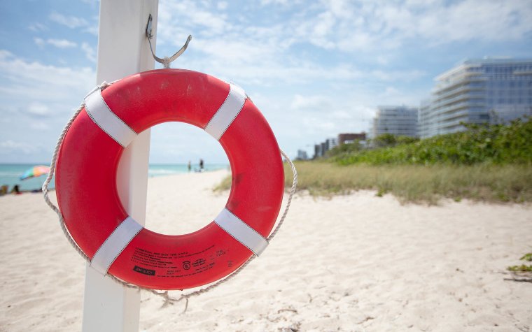 Surfside walking path with life-preserver Surfside walking path with life-preserver